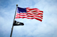 US Flag Flying In Washington DC on Cloudy Day