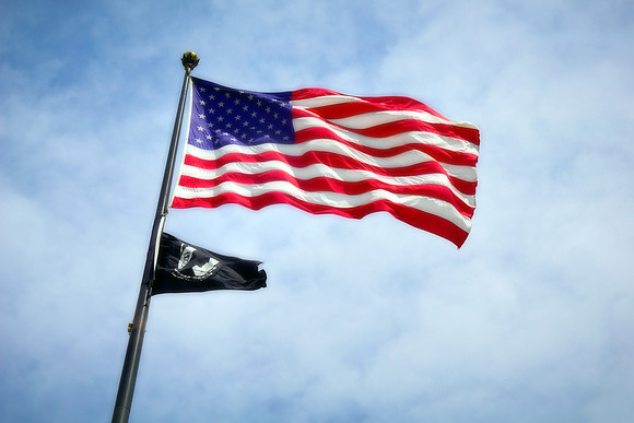 US Flag Flying In Washington DC on Cloudy Day